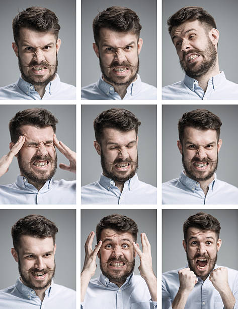 istock Set of young man's portraits with different emotions 543450228