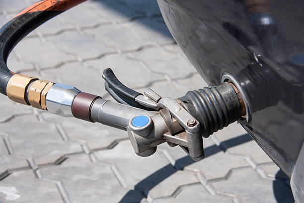 istock gas refueling a car at station close-up 543453336