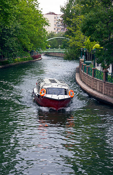 Porsuk river Boats and Gondolas are sailing in the Porsuk River, Eskisehir. People like travelling by boats on river in Eskisehir, Turkey. eskisehir stock pictures, royalty-free photos & images