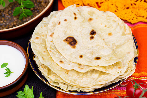 Indian flatbread chapati or roti Indian unleavened flatbread chapati or roti shrak stock pictures, royalty-free photos & images
