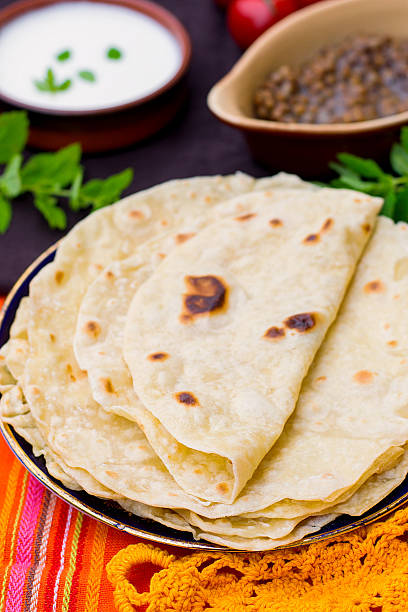 Indian flatbread chapati or roti Indian unleavened flatbread chapati or roti shrak stock pictures, royalty-free photos & images