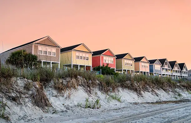 Photo of Beachfront vacation cottages in summer