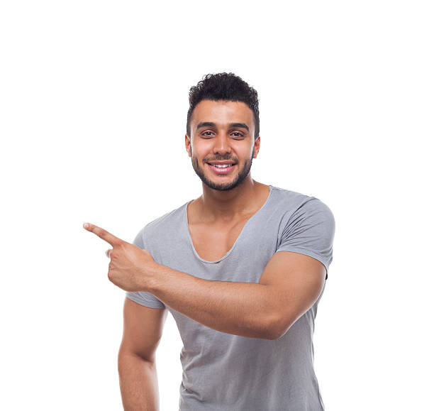 istock Casual Handsome Man Point Finger At Corner To Copy Space 543456172