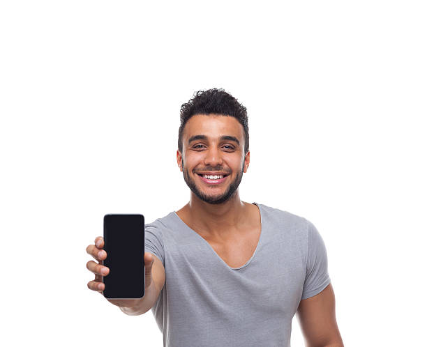istock Casual Man Displaying Mobile Cell Smart Phone 543456324