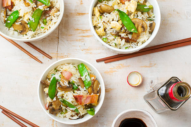 istock fried rice with mushrooms and peas 543458568