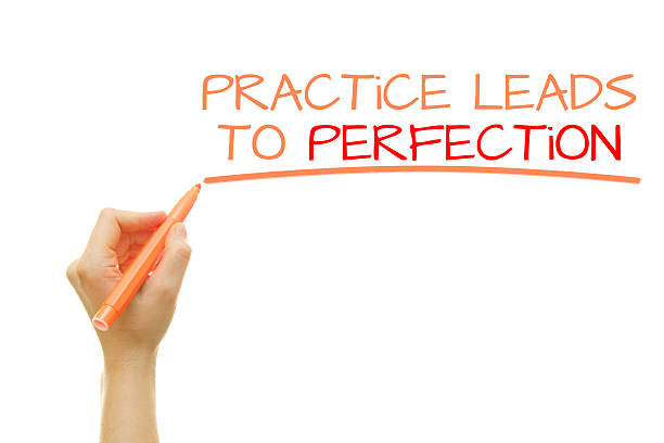 istock Hand writing Practice leads to perfection 543463074