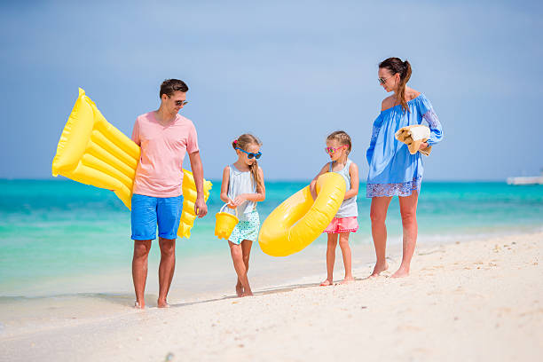 istock Happy family with two kids on vacation 543464310