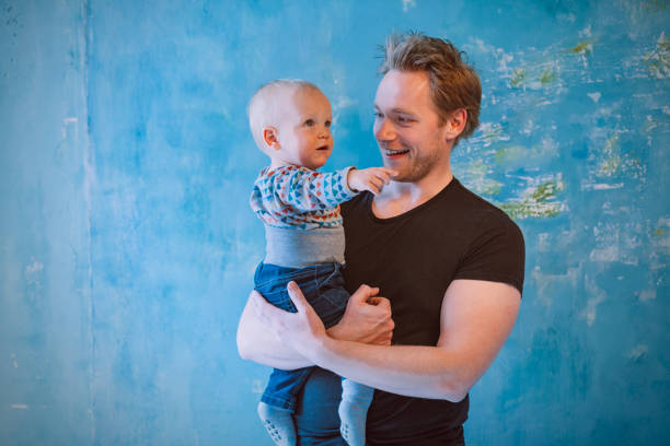 istock Happy young father and baby 543468058