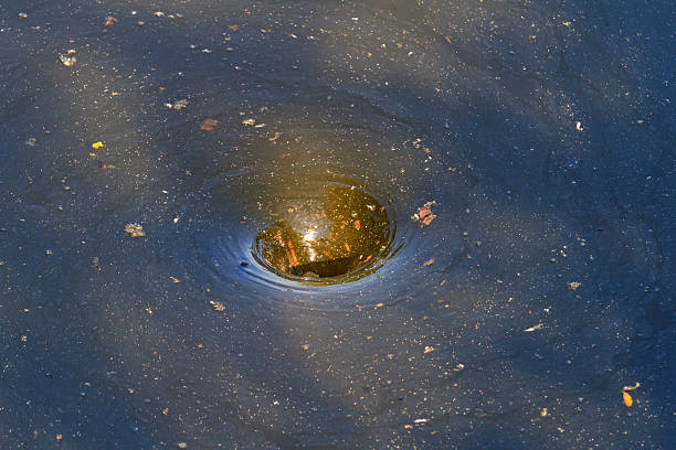 istock whirlpool in dirty water 543469396