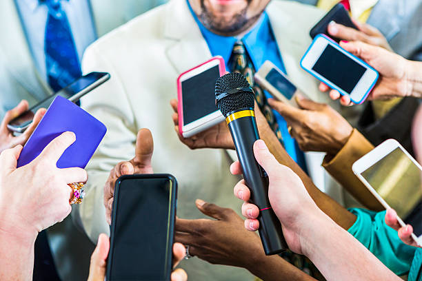 istock Journalists trying to get man on record 543471202