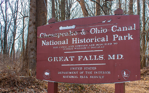 Hagerstown, MD, USA - February 11, 2009: The main entrance sign of the Chesapeake and Ohio Canal National Historical Park on a cloudy day in the winter of 2009.