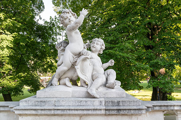 Sculpture of putti near entrance of Neue Burg, New Castle, in Burggarten Gardens, Hofburg in downtown Vienna, Austria