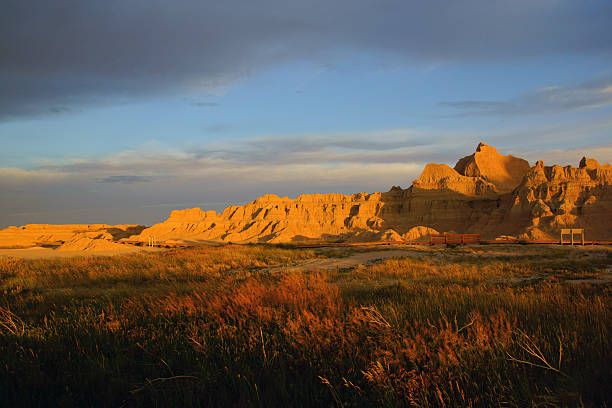 istock Sunrise at Badlands National Park grasslands 543476198