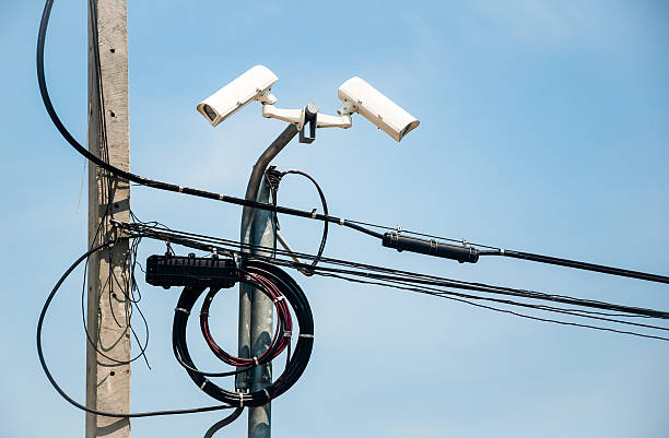 istock The surveillance cameras on blue background 543477694