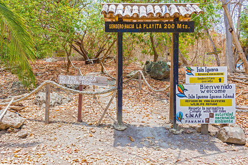Iguana Island, Panama - April 26, 2016: Welcome signs on the beach at Iguana island. It is wildlife refuge on Pacific Ocean near Pedasi, Panama,