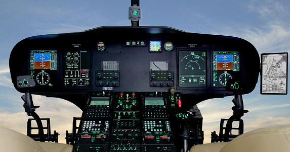 Helicopter instruments in Agusta flight simulator cockpit.
