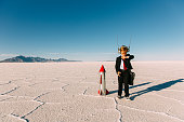 Young Boy Businessman Launching Rocket