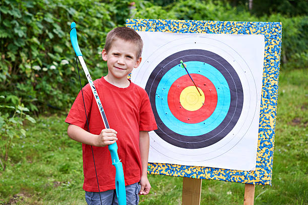 istock Little archer with bow and arrow 543486894