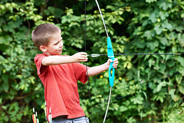 istock Little archer with bow and arrows 543487214
