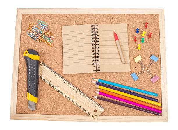 istock concept and office supplies on cock board 543488314