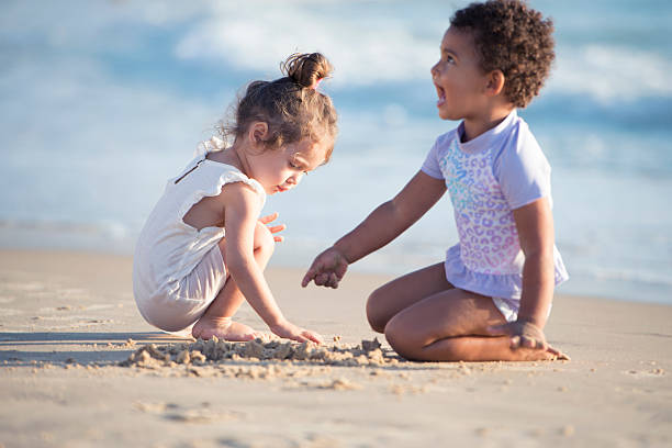 Free Stock Photo of Two Little Girls Playing in the Water at the Beach ...