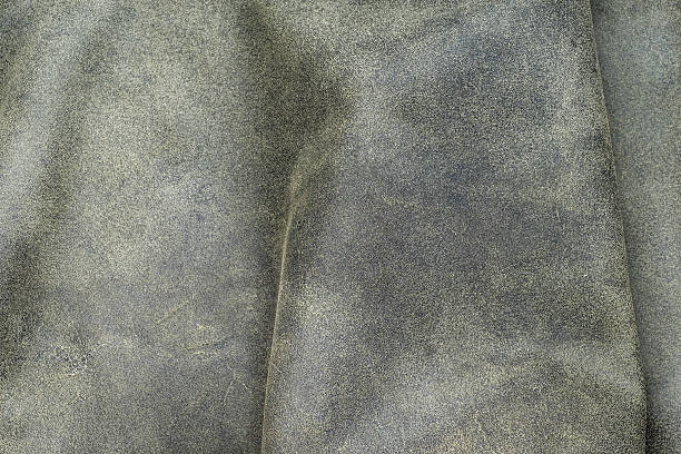istock Close up grain grey color leather texture background 543555470