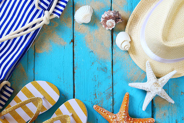 istock nautical concept with fedora hat, flip flops and seashells 543557156