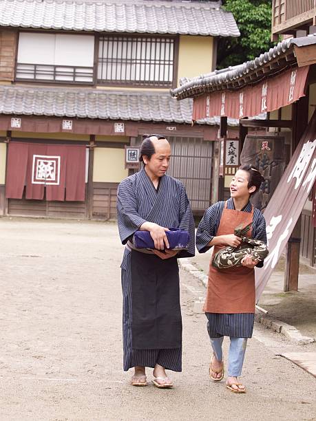 istock Japanese merchant and his assistant in Edo Period 543560596