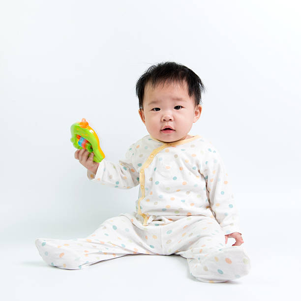 istock Asian baby with toy 543561370