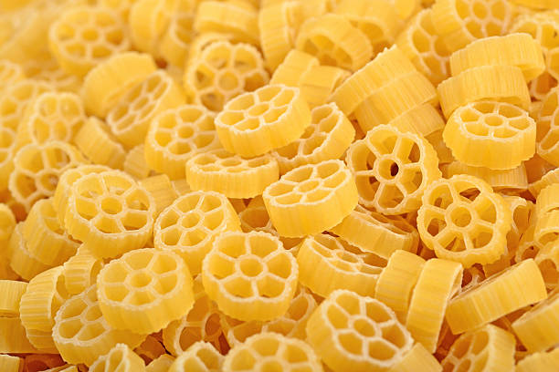 istock Uncooked italian pasta rotelle close up 543561506