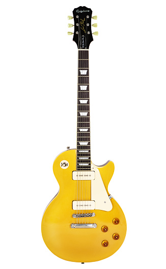 Cape Town - June 29, 2016: A '56 Les Paul Pro electric guitar in goldtop finish, manufactured in 2014 by Epiphone, a brand of the US-based Gibson corporation. This instrument is an authentic, authorized reproduction of a 1956-vintage Gibson model, complete with a fat neck profile and  P-90 pickups of the type originally fitted to the Les Paul before their replacement by humbuckers in the late 1950s. P-90 pickups are riding the modern retro wave and returning to favor among guitarists.
