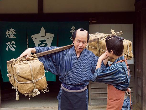 istock Japanese merchant teaches  his assistant in Edo Period 543563774