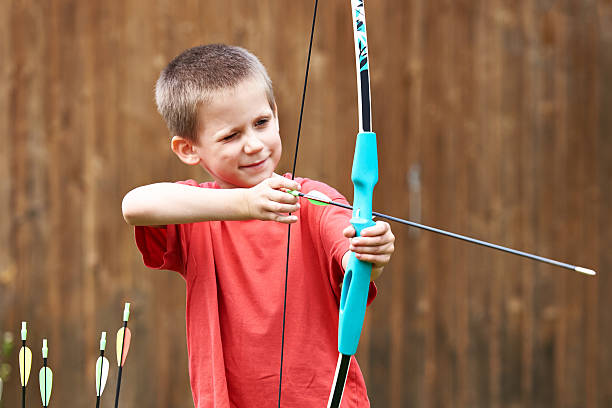 istock Little archer with bow and arrows 543564820