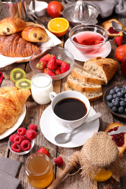 istock coffee cup,croissant and fruit 543565622