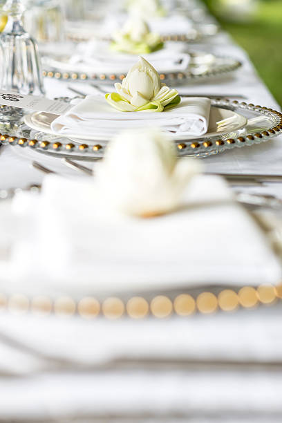 istock Elegance table set up with lotus flowers, selective focus. 543565658