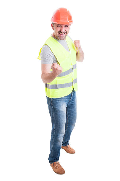 istock Full body of joyful successful constructor male 543565758