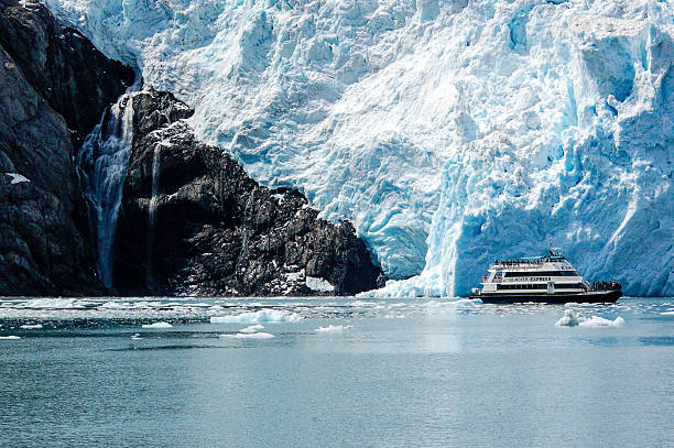 Cruise tour at Holgate Glacier of Aialik bay in Alaska Alaska, United States - June 3, 2009: A day cruise tour start from Seward took the tourists to see closely Holgate glacier of Aialik bay in Alaska. seward alaska stock pictures, royalty-free photos & images