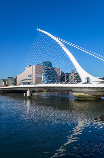 Dublin, Ireland - April 14, 2015: View of Quayside and the Samuel Beckett Bridge crossing the River Liffey in Dublin, Ireland