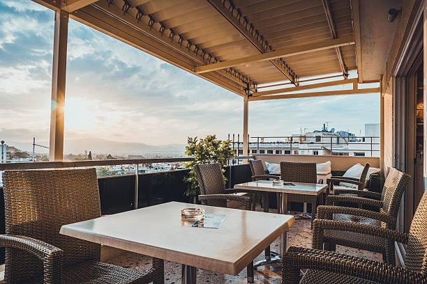 istock Restaurant tables and chairs on an open air patio 543567578