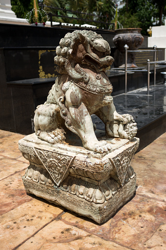 A lion statue symbolizes to the protector in front of the entry way.