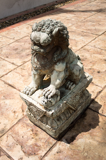 A lion statue symbolizes to the protector in front of the entry way.