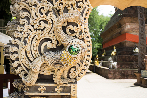 A peacock statue symbolizes to the protector in front of the entry way.