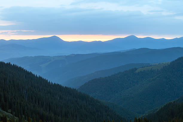 istock Black stormy sky in the rain in the mountains. 543570474