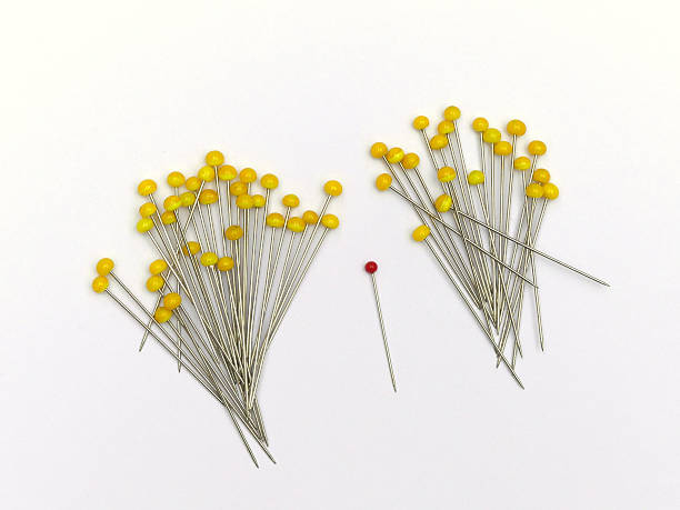 istock Stationery - yellow map pins with single red pin 543571774