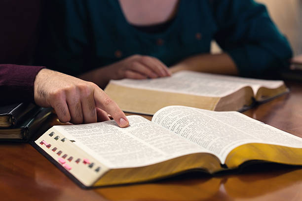 istock Young Couple Studying The Bible 543572144