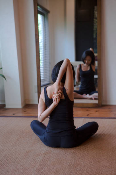istock japanese female doing physical relaxation exercise in kyoto japan 543572940