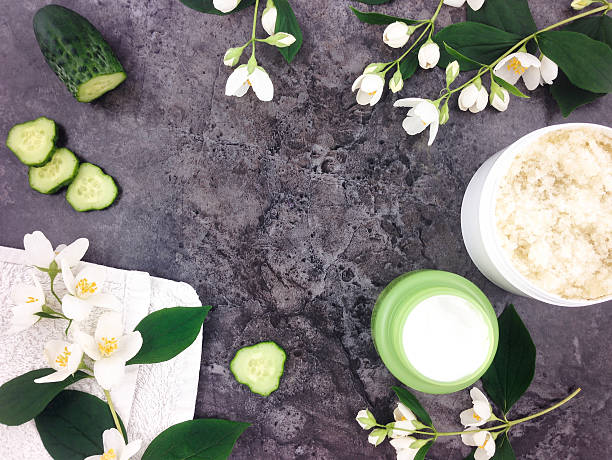 Set of spa treatment products on stone background. Flat lay