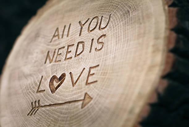 istock All you need is Love. The inscription on the tree 543575722