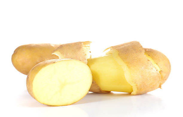 istock Fresh potatoes full ball and cut half on white background. 543579494