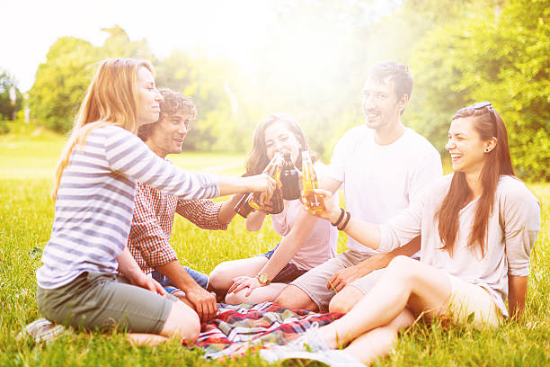 istock Toast in nature between cheerful friends. 543580006